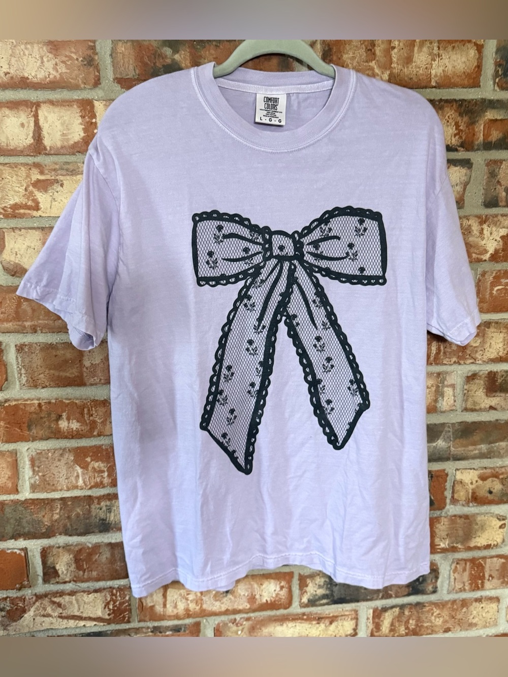 Comfort Colors Orchid Short Sleeve Tee with Black Bow Graphic